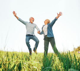 Wall Mural - woman man outdoor senior couple happy lifestyle retirement together love jumping fun nature mature