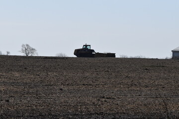 Canvas Print - Tractor in a Field