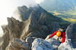 Climbing alpinist on Koenigsjodler route, Austria