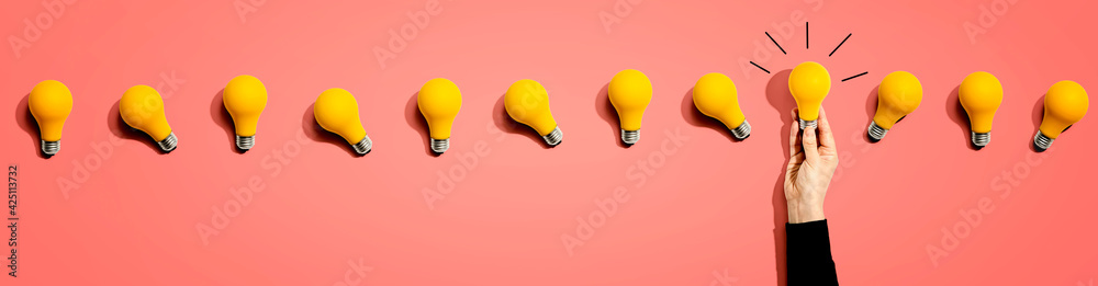 Many yellow light bulbs - obrazy, fototapety, plakaty 