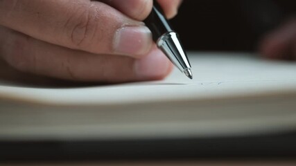Poster - Close up view of a handwriting down on a white blank notebook