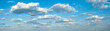 panorama of clouds against the blue sky. Background, wallpaper. Gradient transition from dark to light. Weather forecast screensaver, website, banner.