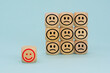 © Alena - Wooden Block With Happy And Unhappy Face. Customer service rating or satisfaction concept.Business service rating and customer satisfaction