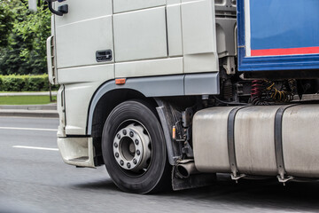 Truck moves along the street in the city