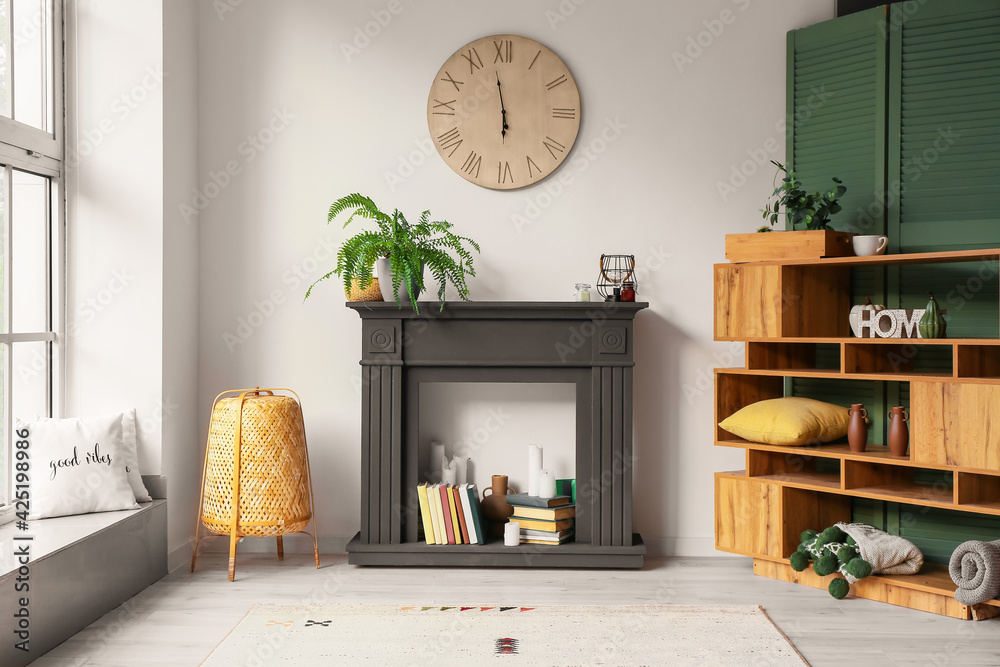 Interior of stylish living room with fireplace