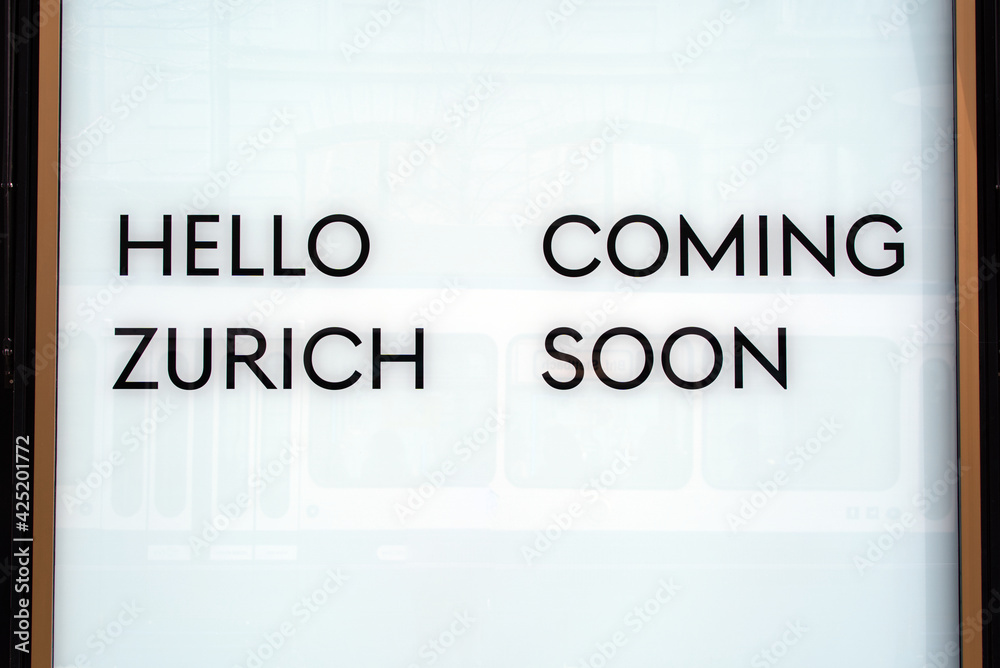 Shopping window with the announcement hello Zurich coming soon for new ...