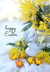 Wall Mural - Happy Easter greeting card. decorative Easter rabbit, mimosa flowers and colorful eggs. spring festive seasonal composition.