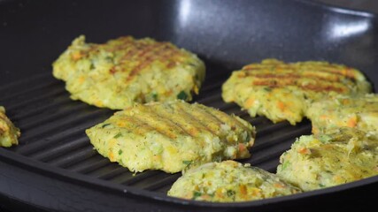 Wall Mural - Vegetarian cutlet cooking from carrot, zucchini, potato. Concept of healthy diet food.