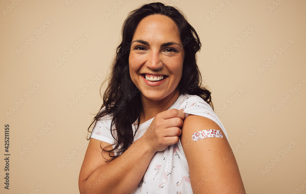 Woman feeling positive after getting vaccination - obrazy, fototapety, plakaty 