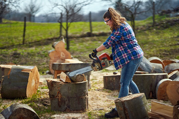 Sticker - Strong woman lumberjack with chainsaw