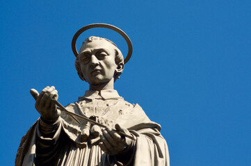 San Carlo Borromeo statue against blue sky in Monte Ceneri village