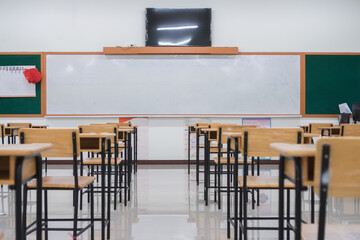 Wall Mural - empty classroom with tv and whiteboard without children and teacher. school empty class room no chil