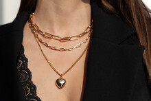 Beautiful Model Brunette In Modern Gold Metal Necklace Chain