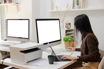 Close-up view of young ui development team working together in office.