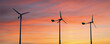 Wind turbine at sunset