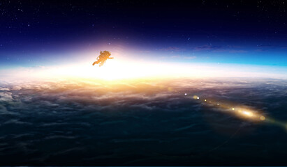 Wall Mural - spaceman and planet, human in space concept