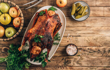 Whole Crispy Golden Roast Duck With Marinated With Fresh Apples For A Festive Dinner.