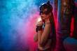 © Nomad_Soul - Sexy woman poses in bdsm suit and leather cat mask