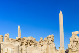 Fototapeta Do akwarium - Granite obelisk against blue sky in a Karnak temple. Luxor, Egypt.