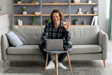 Poster - Man Waving Hand To Laptop Making Video Call At Home