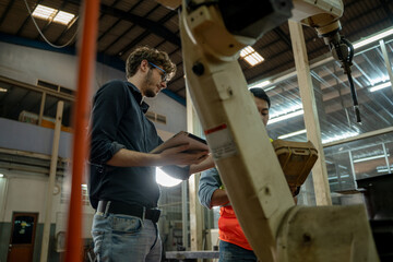 Aufkleber - Factory engineer working together and having discussion in factory,Technical specialist mechanics at heavy industry factory concept.