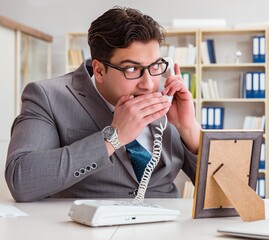 Businessman looking at the picture frame