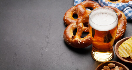 Wall Mural - Lager beer, nuts, potato chips and fresh homemade pretzel