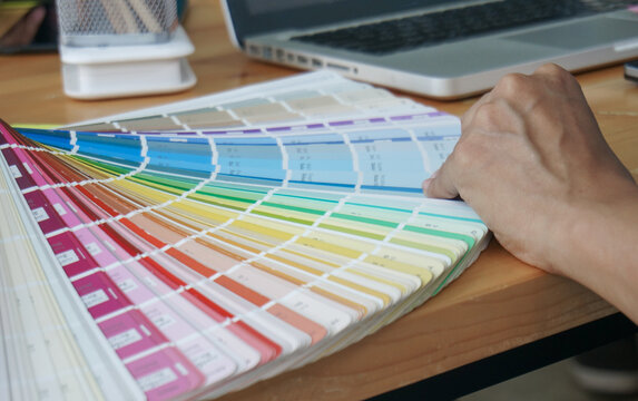 Graphic designer working on digital tablet. artist drawing on graphic tablet and Color swatch samples. Artist Creative Designer sketch graphic drawing creative creativity draw studying work on tablet