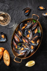 Wall Mural - Dinner with mussels and wine, top shot