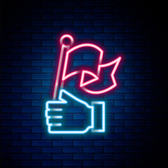 Fototapete - Glowing neon line Hand holding flag icon isolated on brick wall background. Victory, winning and conquer adversity concept. Colorful outline concept. Vector
