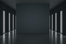 Black Partition With Copyspace In The Center Of Stylish Black Room With Led Lights On Walls. 3D Rendering, Mockup