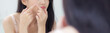 © N_studio - Beautiful young asian woman looking the mirror and touch face is a acne, zit treatment, beauty girl problem beauty and skin with wrinkled on facial in the room at home, makeup and cosmetic concept.