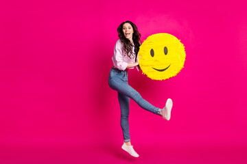 Sticker - Full size profile photo of optimistic brunette nice lady jump hold pinata wear jacket jeans sneakers isolated on pink color background