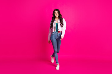 Sticker - Full length photo of pretty cute young woman wear jeans jacket walking isolated bright pink color background