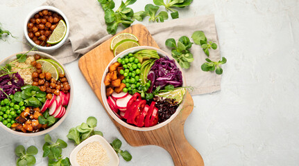 Wall Mural - Tasty colorful vegan poke bowl on light gray background.