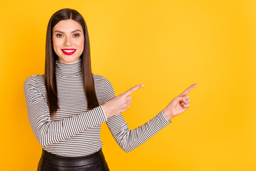 Sticker - Photo of young woman happy positive smile indicate fingers empty space ad promo advice choice isolated over yellow color background