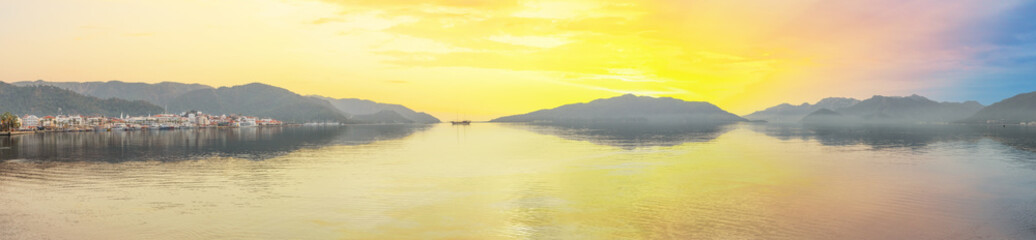 Wall Mural - Panorama of bay in Marmaris under sunset yellow sky