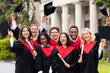 © Prostock-studio - Joyful multiethnic students with diplomas celebrating graduation