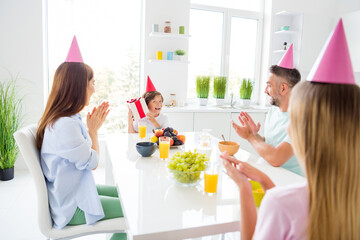 Sticker - Photo portrait of family members celebrating birthday party of little son trying to guess whats inside gift box