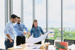 © bigy9950 - Engineers team meeting for architectural project. architects discussing blueprint with construction manager in office worker conference site. Construction Concept