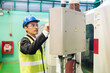 © Blanscape - Factory engineer control CNC lathe machine