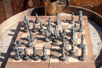 ancient arabic chess with iron pieces