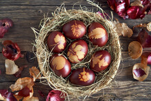 Easter Eggs Dyed With Onion Peels With A Pattern Of Fresh Leaves In A Wicker Basket