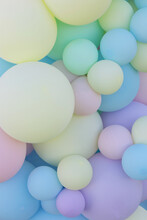 Pastel Colored Balloons Background. Vertical.