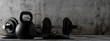 Fitness gym dumbbells and kettlebells with chrome handle and black plates in concrete room background, muscle exercise, bodybuilding or fitness concept