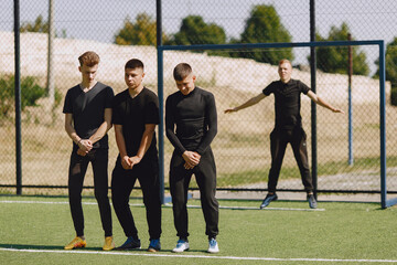 Wall Mural - Spormen is playing football and practising with the ball