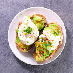 Wall Mural - sandwich- bread with avocado and poached egg