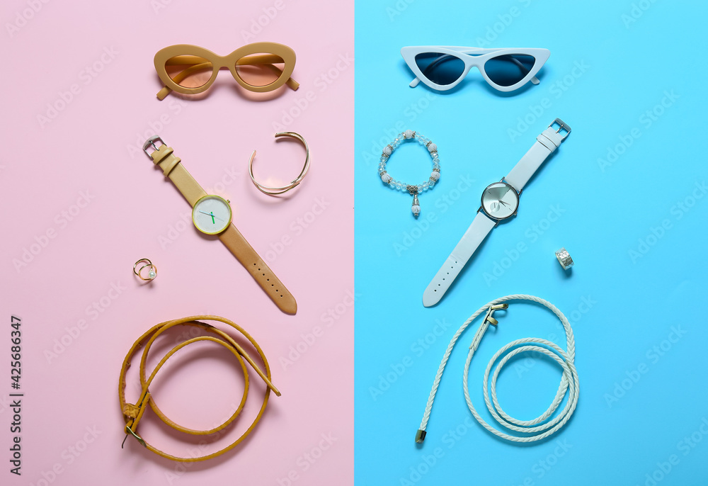 Stylish female accessories on color background