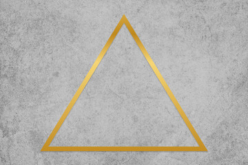 Wall Mural - Gold triangle frame on a gray concrete textured background
