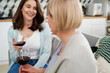 © gpointstudio - Two generation women drinking wine at home
